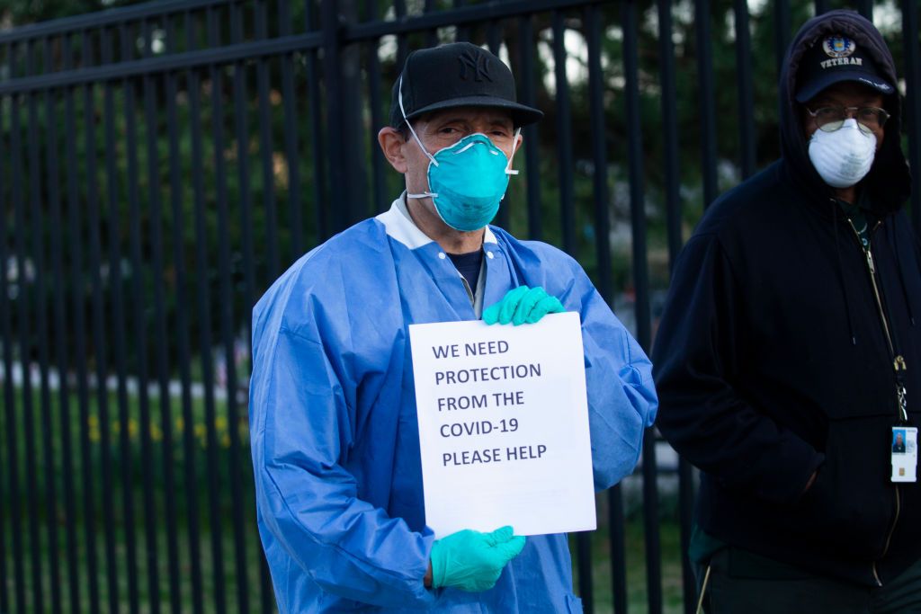 A nurse wearing PPE.