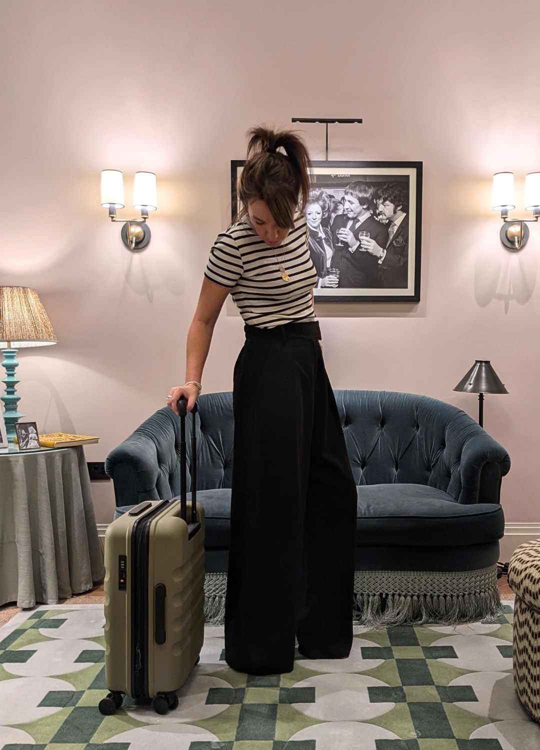 Solo travel expert Lydia Swinscoe with a suitcase