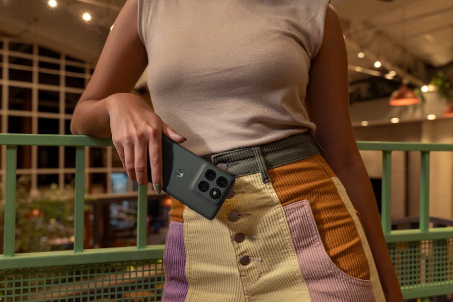 A model holds the new Edge 2025 against their body.