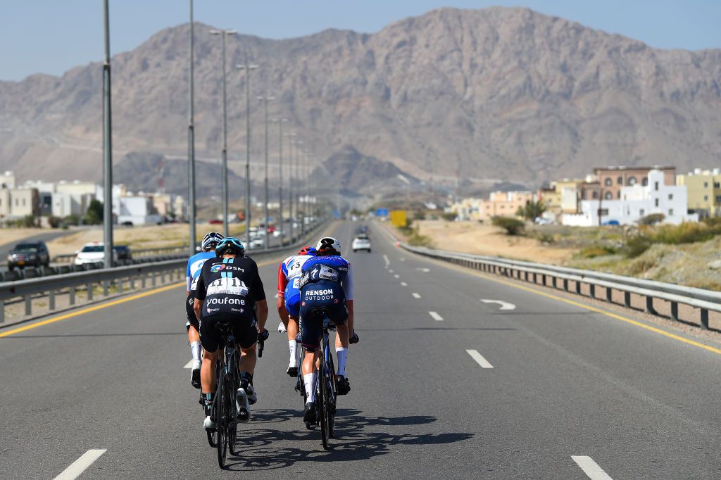 MUSCAT OMAN FEBRUARY 13 A general view of Sren Kragh Andersen of Denmark and Team DSM Antoine Duchesne of Canada and Team Groupama FDJ Marco Canola of Italy and Team Gazprom Rusvelo Jonas Iversby Hvideberg of Norway and Team DSM and Mauro Schmid of Switzerland and Team QuickStep Alpha Vinyl compete in the breakaway during the 11th Tour Of Oman 2022 Stage 4 a 1195km stage from Al Sifah to Mucat TourofOman on February 13 2022 in Muscat Oman Photo by Dario BelingheriGetty Images