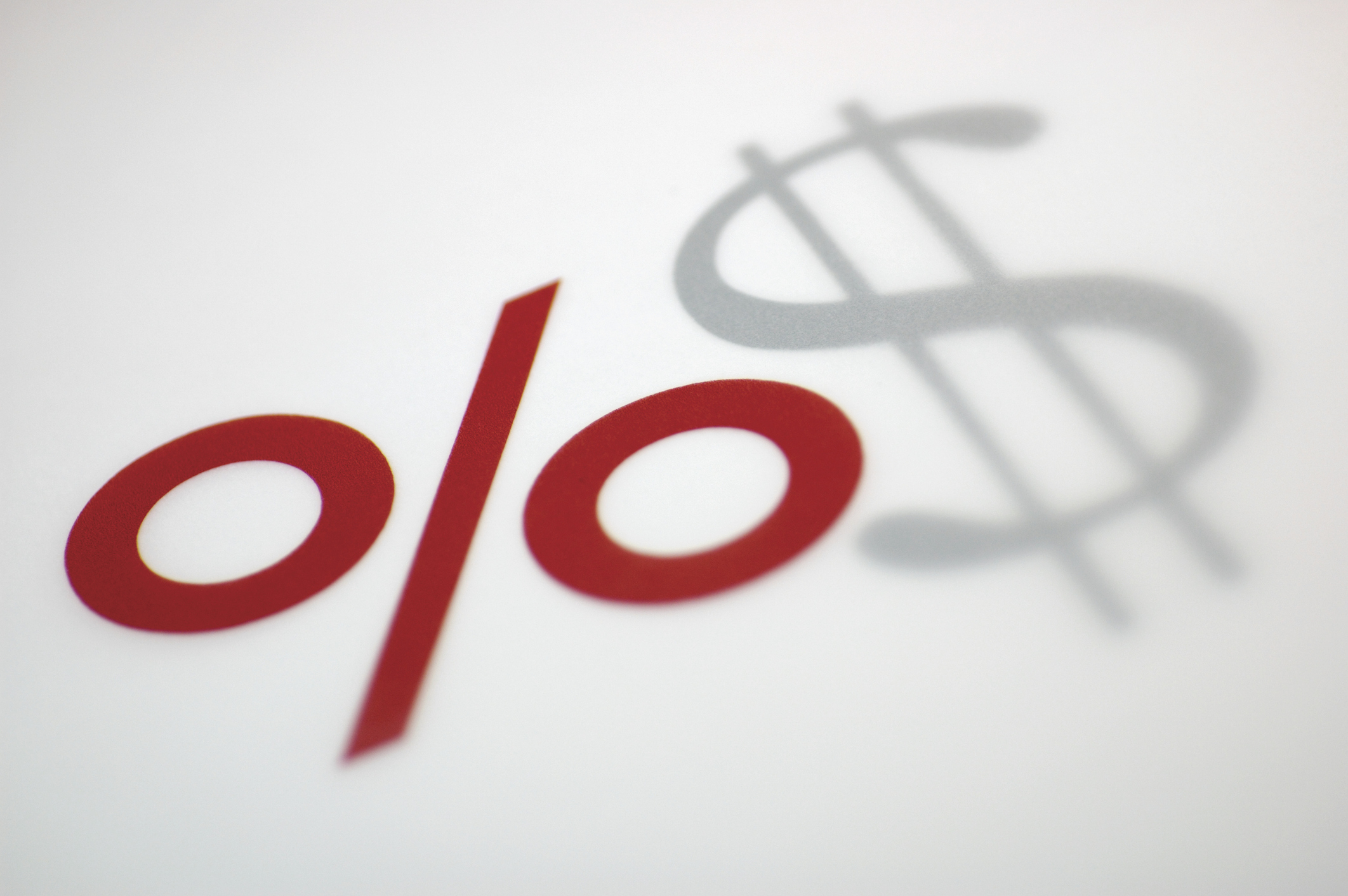 red percent sign next to gray dollar sign