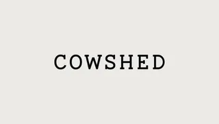 Cowshed logo written in black on a neutral background