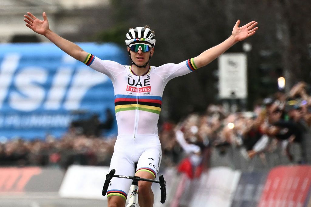 UAE Team Emirates team's Slovenian rider Tadej Pogacar cycles to the finish line to win the 118th edition of the Giro di Lombardia (Tour of Lombardy), a 252km cycling race from Bergamo to Como on October 12, 2024. (Photo by Marco BERTORELLO / AFP)