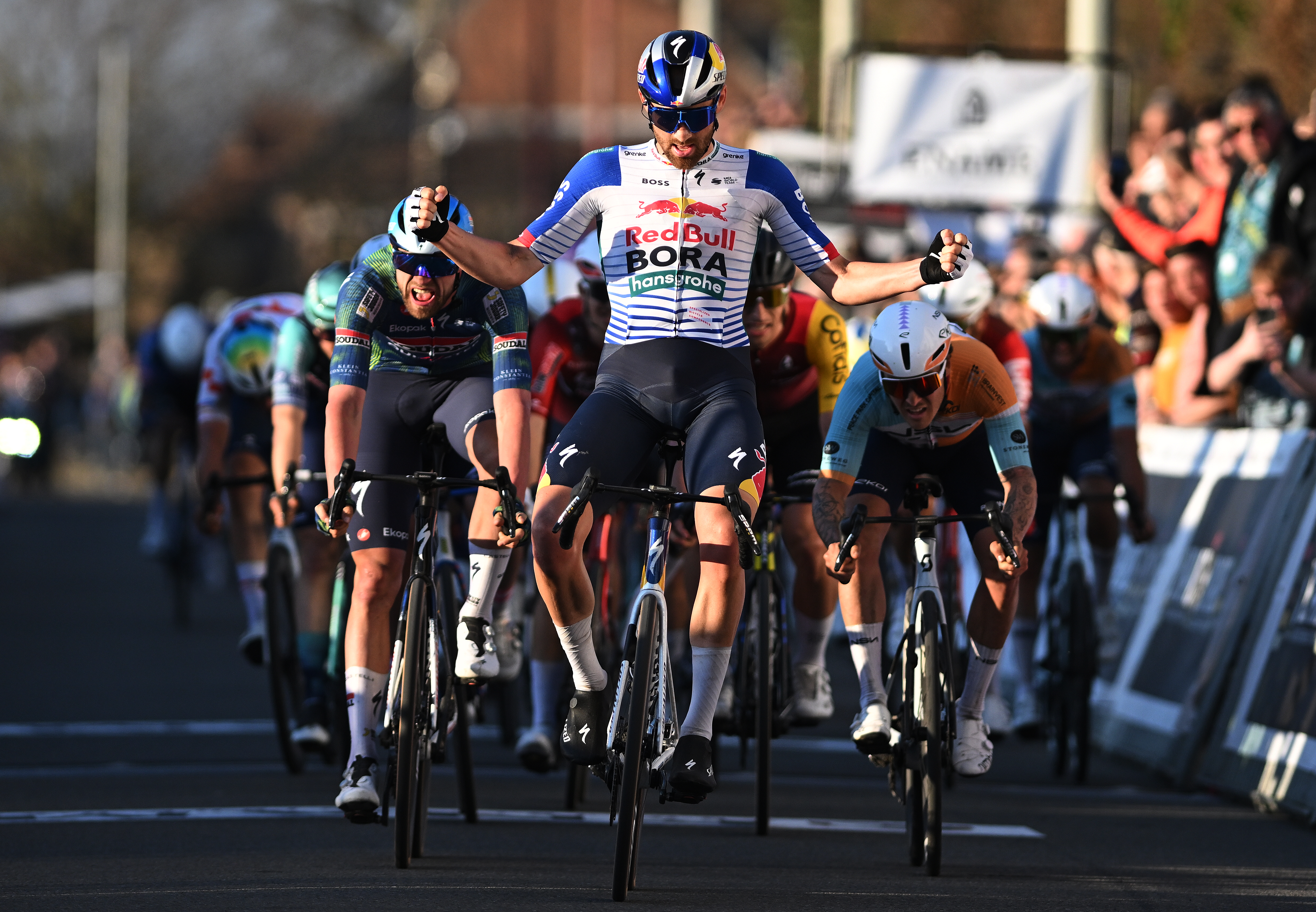 DOUR, BELGIUM - MARCH 03: Jordi Meeus of Belgium and Team Red Bull - BORA - hansgrohe celebrates at finish line as race winner competes during the 58th Ename Samyn Classic 2026 - Men's Elite a 203.8km one day race from Quaregnon to Dour on March 03, 2026 in Dour, Belgium. (Photo by Luc Claessen/Getty Images)