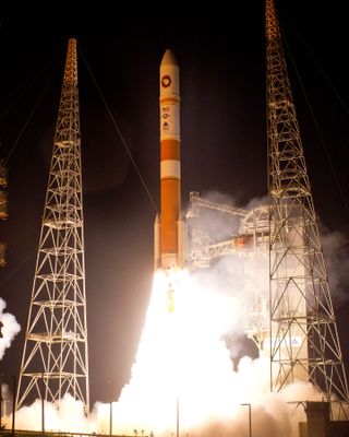 A United Launch Alliance Delta 4 rocket carrying the fifth Wideband Global SATCOM (WGS-5) satellite launches from Space Launch Complex-37 at Cape Canaveral Air Force Station in Florida on May 24, 2013.