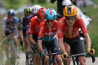 Team Uno-X's Danish rider Magnus Nielsen (R) rides in a breakaway during the sixth stage of the 76th edition of the Criterium du Dauphine cycling race, 174,1km between Hauterives and Le Collet d'Allevard, French Alps, on June 7, 2024. (Photo by Thomas SAMSON / AFP)
