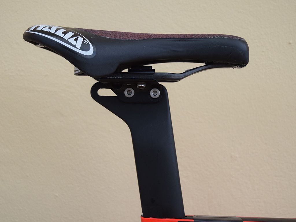 Martin has his saddle pushed forward on the seat post