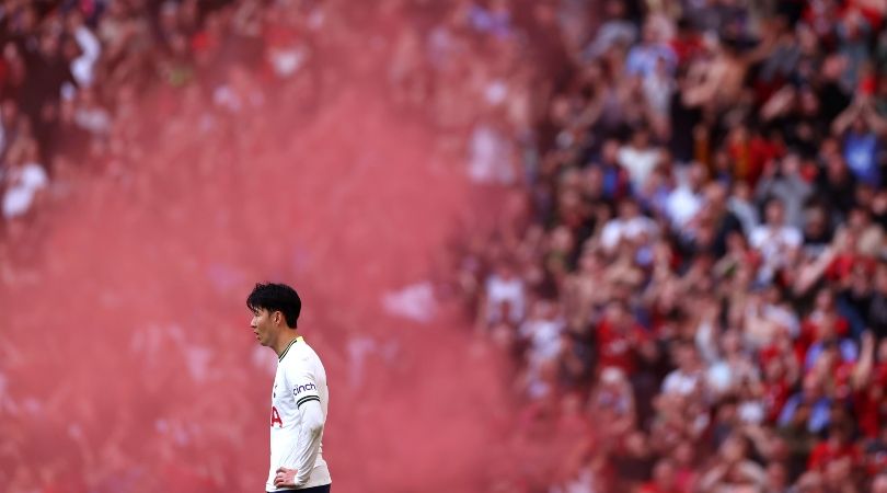 Bournemouth fans launch a flare behind Tottenham&#039;s Son Heung-min after their late winner in the Premier League in April 2023.