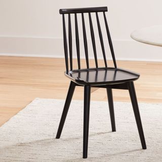 Best contemporary dining chair black wooden on a rug 
