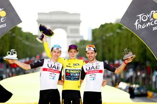 PARIS FRANCE JULY 23 LR Tadej Pogacar of Slovenia and UAE Team Emirates on second place race winner Jonas Vingegaard of Denmark and Team JumboVisma Yellow Leader Jersey and Adam Yates of United Kingdom and UAE Team Emirates on third place pose on the podium ceremony after the stage twentyone of the 110th Tour de France 2023 a 11 51km stage from SaintQuentinenYvelines to Paris UCIWT on July 23 2023 in Paris France Photo by Etienne Garnier PoolGetty Images
