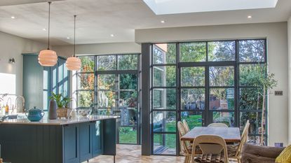 kitchen diner extension with dark grey heritage Crittall style doors