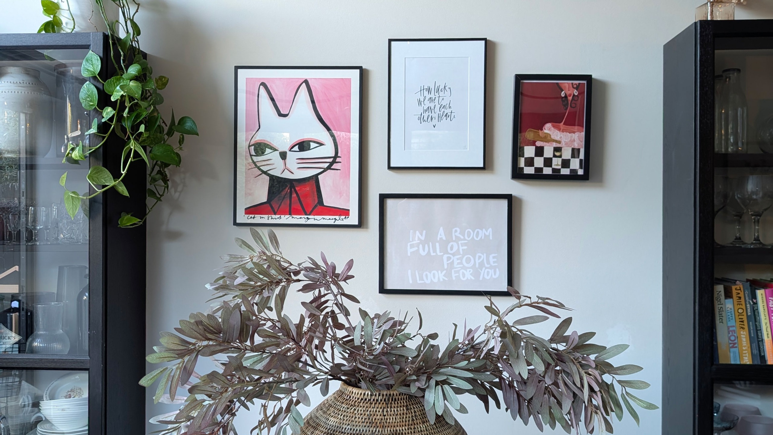 Gallery wall between two free standing cabinets