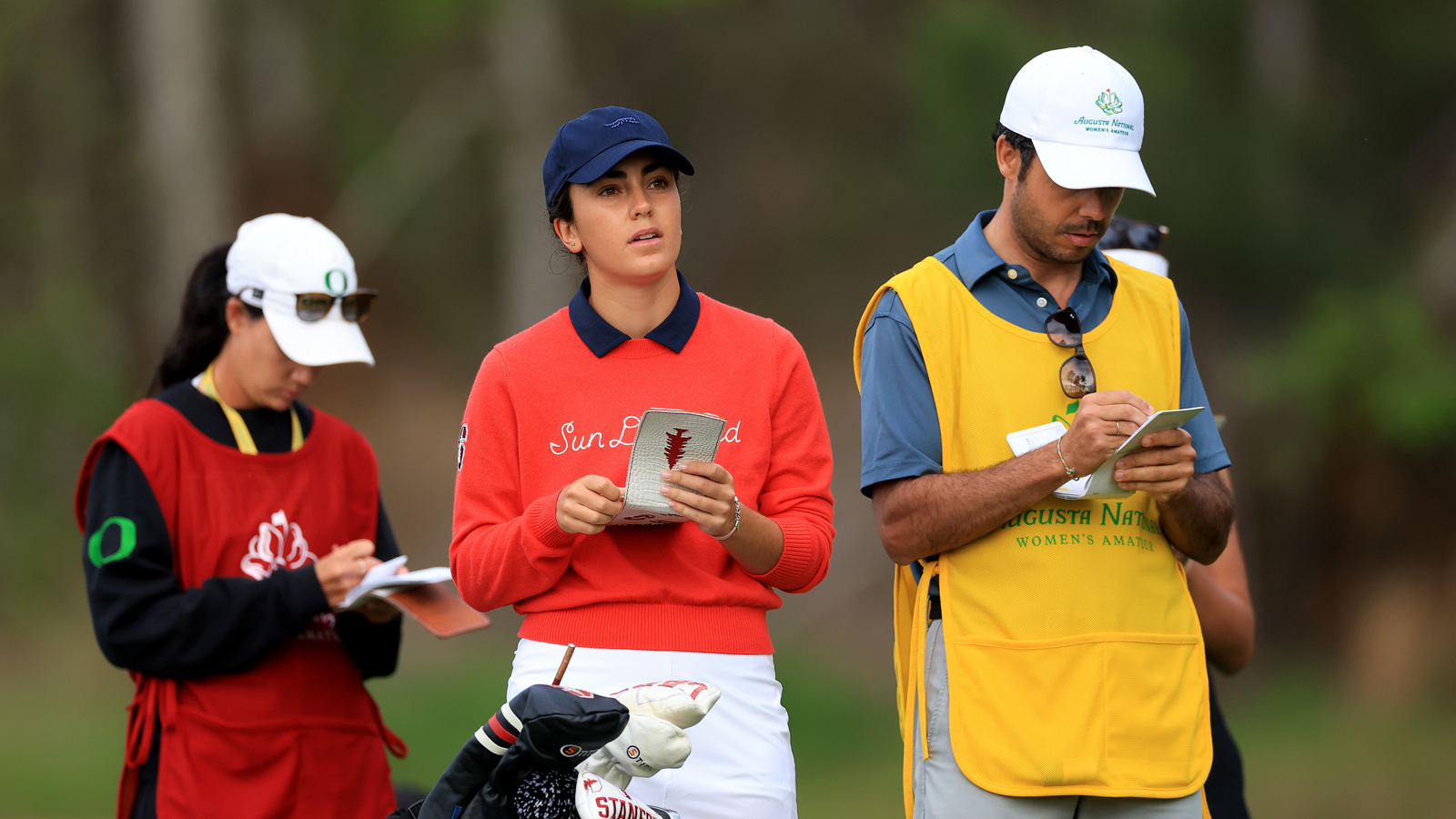 Andrea Revuelta looks through her yardage book during the Augusta National Women's Amateur