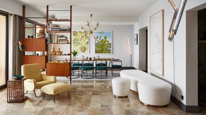 A white living room with retro furniture 