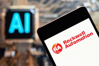 Rockwell Automation logo on smartphone with blurred image of the letters spelling "AI" in background