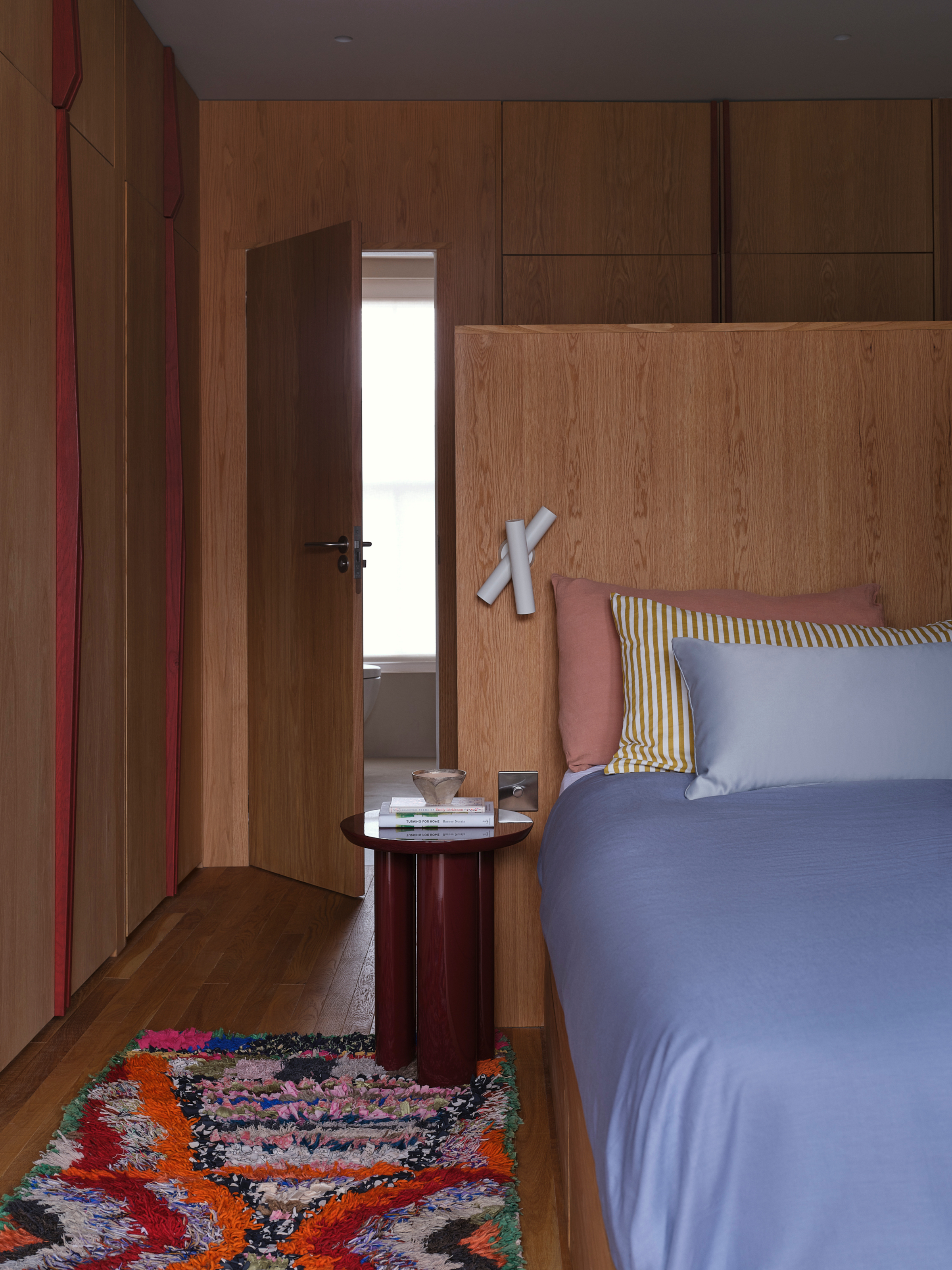 Bedroom with oak wardrobes and matching oversized headboard