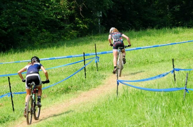 Deidre York (The Gear Movement) leading up a ski slope climb