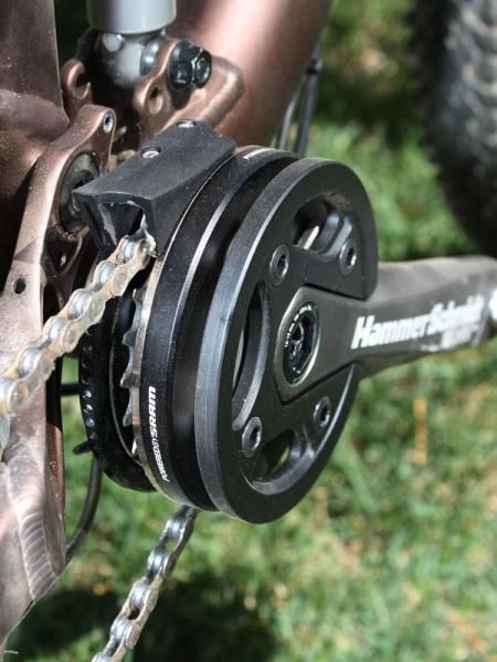 The chainring is fully sandwiched on both sides and with the upper box guide properly positioned, it's virtually impossible to drop a chain.
