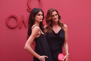 Omega Brand Ambassadors Kaia Gerber and Cindy Crawford attend the opening night of OMEGA House Paris 2024 on July 27, 2024 in Paris, France.