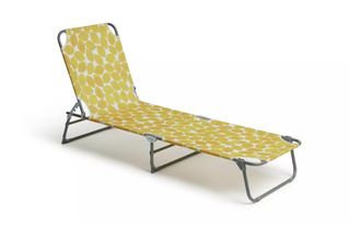A fun sun lounger with lemon print fabric