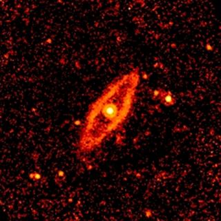 NGC 4772 contains a dust ring that is bright in mid-infrared light. Dust rings like this are common in many spiral galaxies.