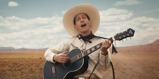 Tim Blake Nelson with guitar in The Ballad of Buster Scruggs