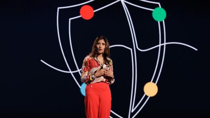 Vasu Jakkal, corporate vice president, Microsoft Security, stood on the RSAC Conference 2025 keynote stage with a stylized Google Threat Intelligence logo behind her.