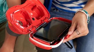 Mattel view master in hand with mobile in situ