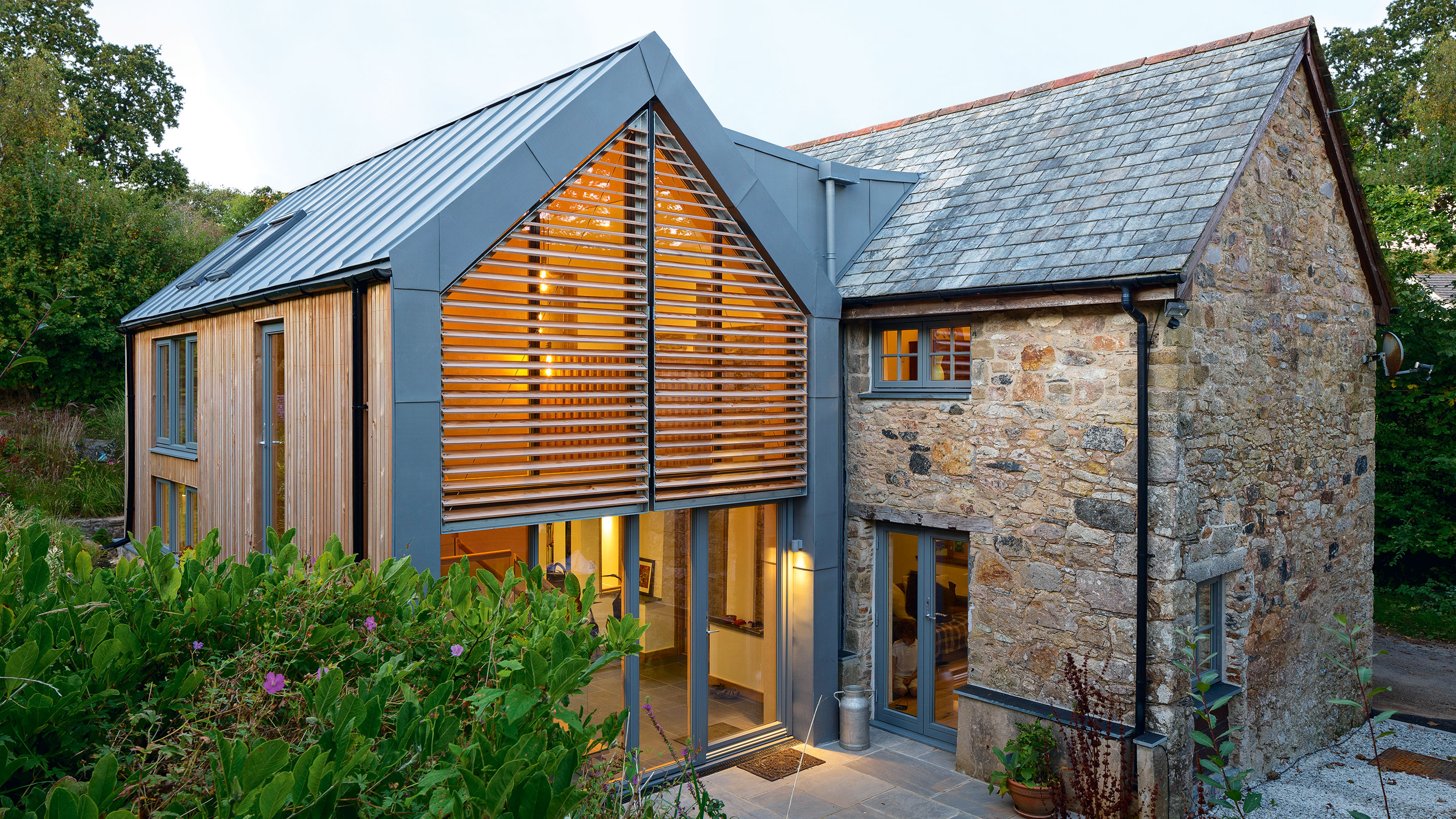 contemporary two storey extension with external shutters