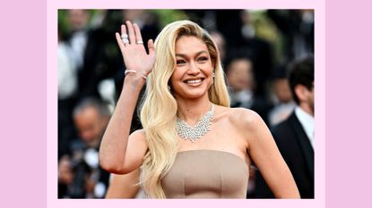 Gigi Hadid attends the "Firebrand (Le Jeu De La Reine)" red carpet during the 76th annual Cannes film festival at Palais des Festivals on May 21, 2023 in Cannes, France/ in a purple/ blue template