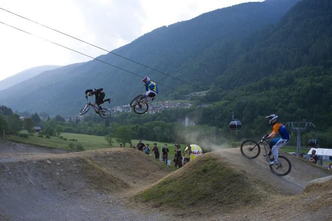 Four cross racers in action