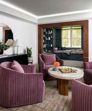 Living room with marble coffee table and purple armchair