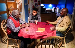 Denzel Danes plays a game with Patrick Trueman and Howie Danes