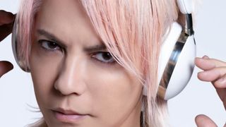 Pop star HYDE wearing a pair of white WA-J1 headphones