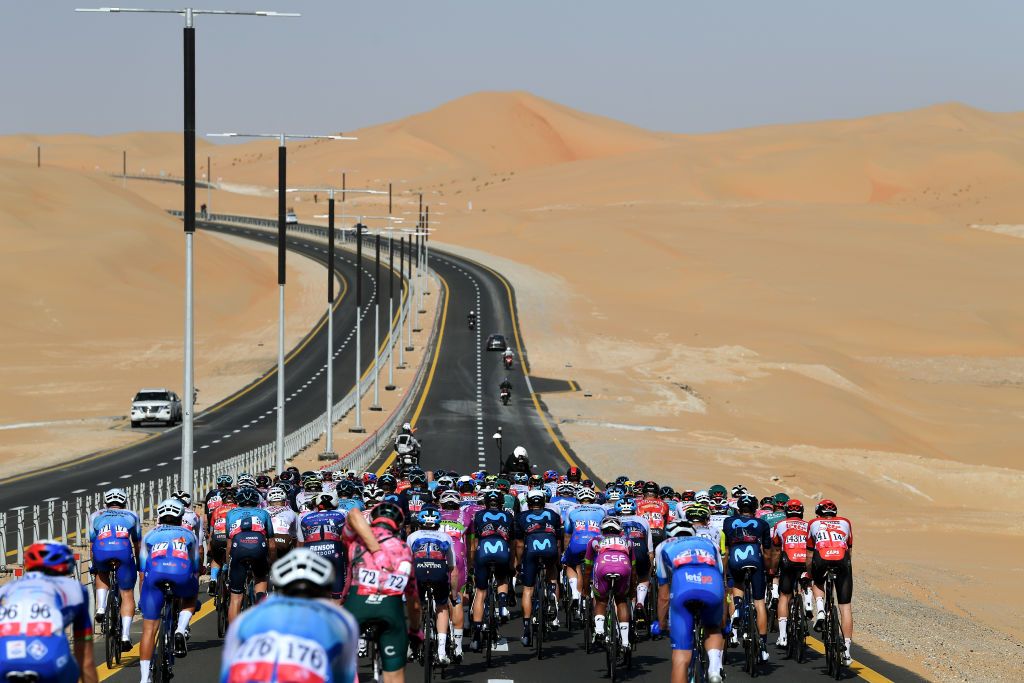 MADINAT ZAYED UNITED ARAB EMIRATES FEBRUARY 20 A general view of the Peloton passing through the desert during the 4th UAE Tour 2022 Stage 1 a 184km stage from Madinat Zayed to Madinat Zayed UAETour WorldTour on February 20 2022 in Madinat Zayed United Arab Emirates Photo by Tim de WaeleGetty Images