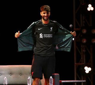 PHILADELPHIA, PENNSYLVANIA - JULY 30: (THE SUN OUT, THE SUN ON SUNDAY OUT) Dominik Szoboszlai of Liverpool showing the new Liverpool away kit during a fan even at The Fillmore Philadelphia on July 30, 2024 in Philadelphia, Pennsylvania. (Photo by Andrew Powell/Liverpool FC via Getty Images)