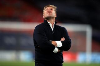 Karl Robinson shows his frustration after defeat at Wembley