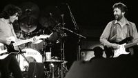 Albert Lee performs on stage with Eric Clapton at Ahoy, Rotterdam, Netherlands, 23rd April 1983