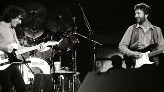 Albert Lee performs on stage with Eric Clapton at Ahoy, Rotterdam, Netherlands, 23rd April 1983 