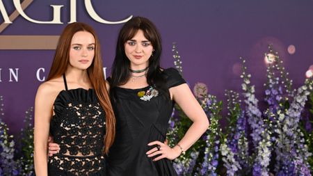 Maisie Williams and Joey King posting together at the Practical Magic 2 London Premiere. 