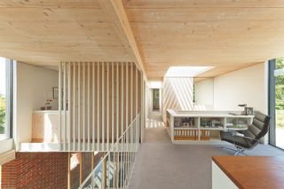 landing mezzanine space with timber cladding