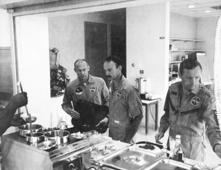 Apollo 11 Crew Prepare to Dine