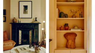 a pale pink living room with a black iron fireplace and decorative objects on built in shelves