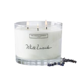 A large lavender candle