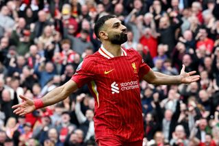 Mohamed Salah of Liverpool celebrates scoring his team's second goal during the Premier League match between Liverpool FC and Southampton FC at Anfield on March 08, 2025 in Liverpool, England.