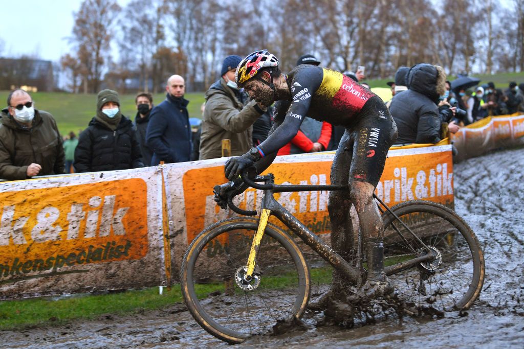 BOOM BELGIUM DECEMBER 04 Wout Van Aert of Belgium and Team Jumbo Visma competes on a muddy sector during the 7th Superprestige Cyclocross Boom 2021 Mens Elite SPBoom Superprestige2022 on December 04 2021 in Boom Belgium Photo by Luc ClaessenGetty Images