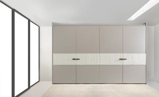 A view of light grey wardrobes