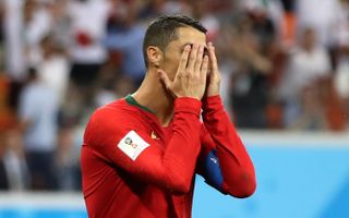 Cristiano Ronaldo reacts after missing a penalty against Iran at the 2018 World Cup.