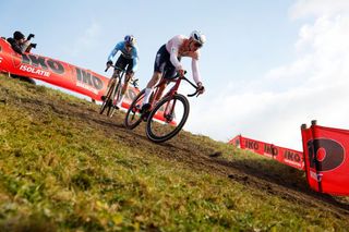 Wout van Aert and Mathieu van der Poel battling at the 2023 UCI Cyclocross World Championships in Hoogerheide