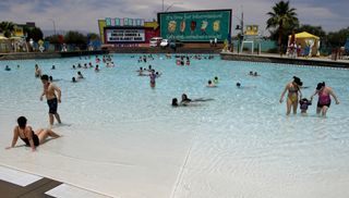 People enjoy swimming in the Surf-a-Rama pool at Cowabunga Bay in Henderson, Nevada